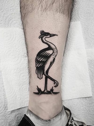 Crane tattoo by Rhys McGrath #RhysMcGrath #cranetattoos #crane #birds #feathers #wings #flying #animal #nature #traditional #blackwork
