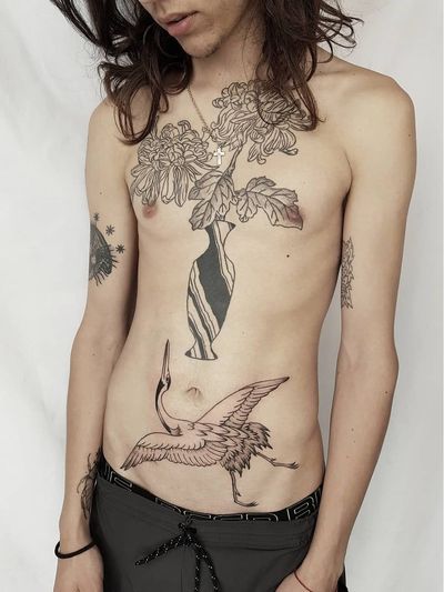 Crane tattoo by Guy Eigel #GuyEigel #cranetattoos #crane #birds #feathers #wings #flying #animal #nature #illustrative #blackandgrey #vase #plant