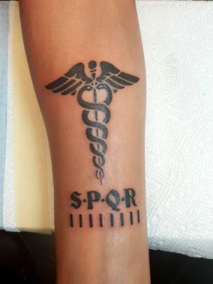 Right forearm, Caduceus of Mercury inspired by the Heroes of Olympus book series. (Done at Skin Abbraisions in Oak Park, IL.)