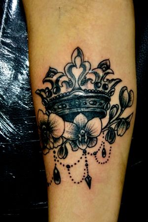 Crown with flower tattoo