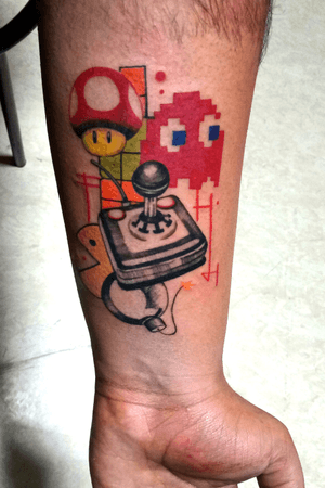 Love for video games. #videogametattoo #colortattoo #smallcolortattoo #illustrative #illustrativetattoo #play #videogame
