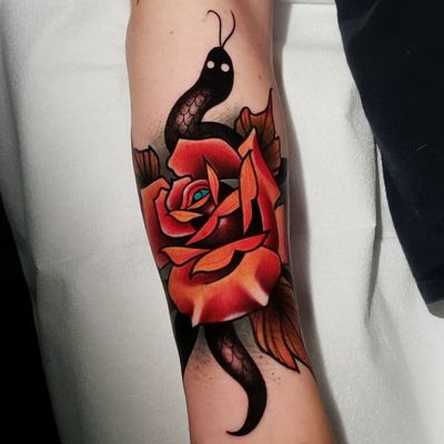 Snake and Rose Tattoo . . . #tattoo #tattoos #tattooartists #tattooartist #dfw #dallas #denton #lewisville #neotraditionaltattooers #neotraditionaltattoo #rebelmusetattoo #benamostattoos #dallastattooartist #flowermound #roses #rosetattoo #colortattoo #snaketattoo #snakes #snake #plano #grapevine #mckinney 