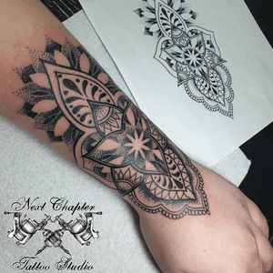 Custom Lotus Mandala wrist piece for Sarah, Sarah's collection has grown substantially over the 3 years she has been visiting us, making her a true collector. We love the intricate line work and dot work. Next Chapter Tattoo & Piercing Studio 24 Abbotsbury Road Morden SM4 5LQ Tel: 0203 8374908 www.nextchaptertattoo.com #mandala #Lotus #Dotwork #Dotworktattoo #Tattoo #femanineTattoo #WristTattoo #Girlswithtattoos #Ink #Inked #Girlydesign #GeometricTattoo #CustomTattoo #Morden #Mordentattoo #London #SouthLondon #Handtattoo #Blackwork #Mandalatattoo #customink #customtattoo