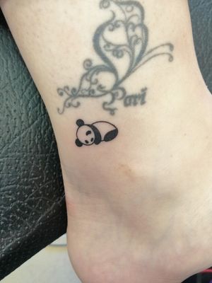 Tiny little panda added to the ankle ( old tat not done by us) 