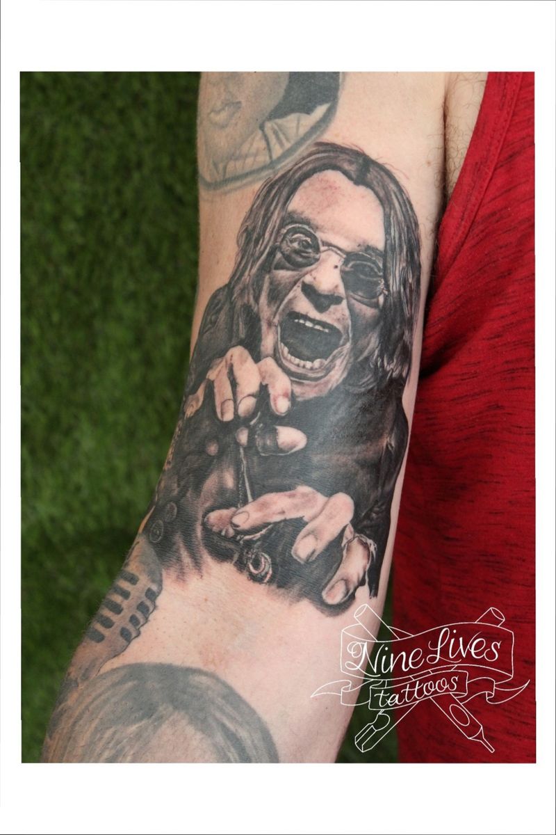 ozzy osbourne cross tattoo