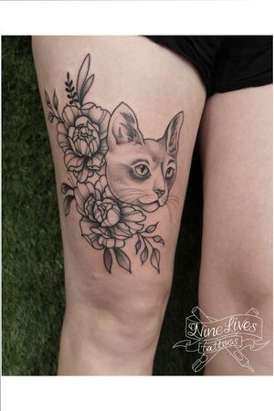 A custom design of peonies and a kitty with Dotwork shading by our artist Tara Gypsy Apples