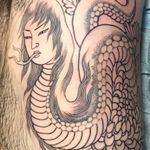 Work in progress tattoo by Chris Garver #ChrisGarver #wiptattoo #wip #workinprogress #inprogresstattoo #unfinished #linework #torso #side #ribcage #snake #yokai #chrysanthemum