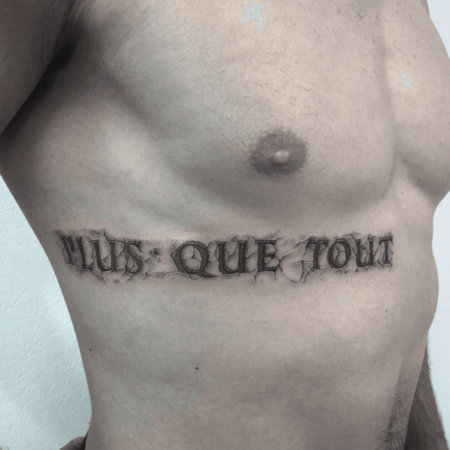 stone lettering tattoos