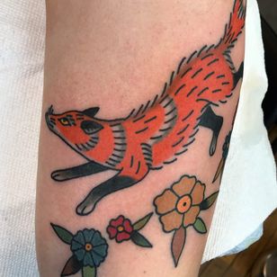 Fox tattoo by Julia Campione #JuliaCampione # fox tattoo # fox tattoos # fox #kitsune #animals #nature #color #traditional #overarm #overarmtattoo #flower #flowers #leaves