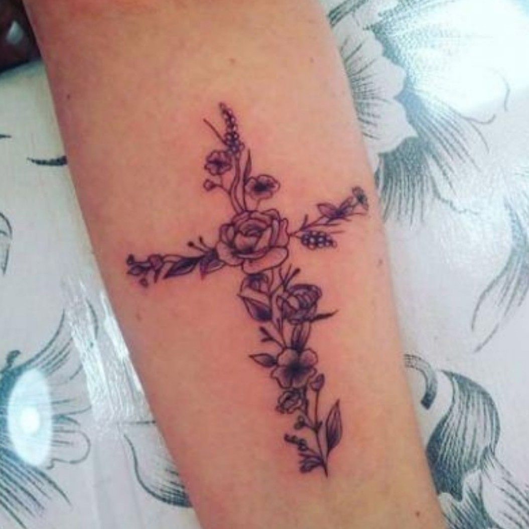 girly cross tattoo