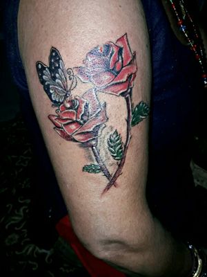Free hand rose with butterfly tattoo work