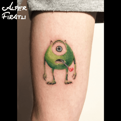 Little Mike Wazowski. For info & booking; alperfiratli@gmail.com #mikewazowski #animation #realistic #tattoo #tattooidea #tattooart #ink #inked #customtattoo #customdesign #tattooist #animetattoo #microtattoo #singleneedle #singleneedletattoo #realistictattoo #microrealism #colorful #colortattoo #intenzeink #monstersinc #mikewazowskitattoo #colorrealism #intenzepride #pixar #disney 