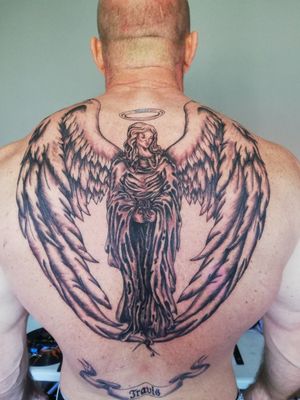 Backpiece of a guardian angel.. My first big back tattoo. Super proud.