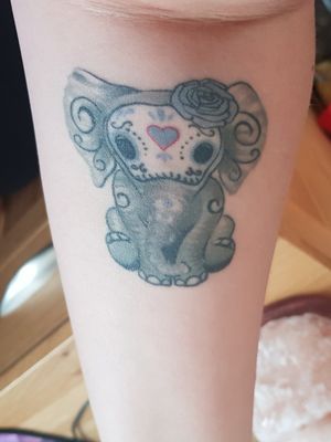 My day of the dead inspired elephant tattoo, that people always comment at how adorable it looks. 