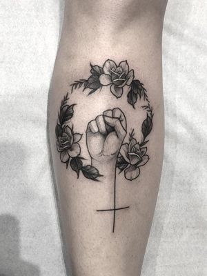 Female empowerment tattoo by Lucas Porto #LucasPorto #femaleempowerment #intersectionalfeminism #womxn #feministtattoo #badasstattoos #cooltattoos #riotgrrl #girlpower #grlpwr #venus #fist #flowers #illustrative #lowerleg #leg 