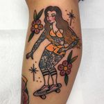 Sk8tr gurl tattoo by Roberto Euan #RobertoEuan #femaleempowerment #intersectionalfeminism #womxn #feministtattoo #badasstattoos #cooltattoos #riotgrrl #girlpower #grlpwr #lowerleg #sk8tr #skater #skateboard #lady #tattooedgirl #flowers 