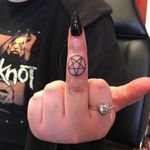 Pentagram finger tattoo