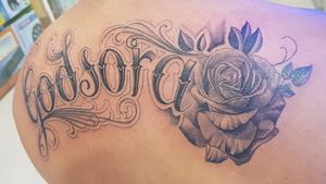 Tattoo by sacred ink tattoo
