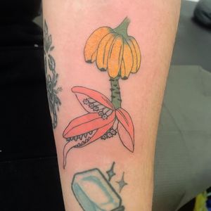 This weeks favorite tattoo by gay famous #gayfamous #favoritetattoos #besttattoos #awesometattoos #tattooidea #cooltattoos #uniquetattoos #tattooinspiration #banana #food #floral #surreal #weird #forearm
