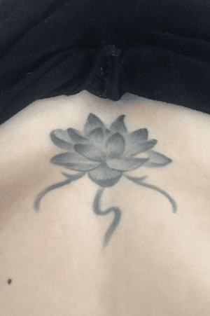Lotus flower on my sternum and ribs