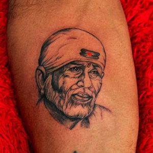 Sai Baba tattoo done by Sudarshan Dubey at Mr. Ink Tattoos indore.It's a religious design Contact -9713616441Get inked from us