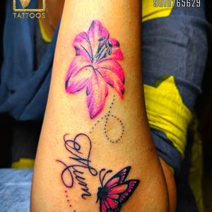 Pink flower Butterfly tattoo