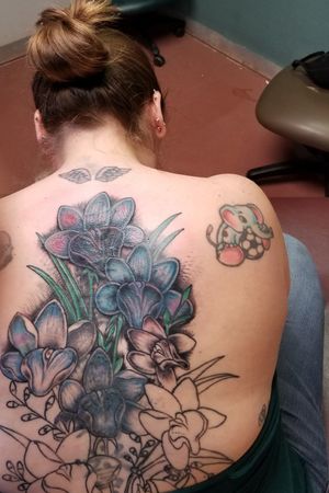 Middle of process to cover up a tattoo; blue orchids by Mick @ Whittling Wizard Tattoo