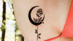 Beautiful rose and moon done by #catink_tattoo . 1 day old, still a little bruised..#blackwork #dotwork #ribtattoo #rose #moon #freshtattoo #firstattoo 