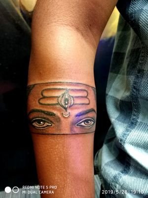 Shiva half face band tattoo