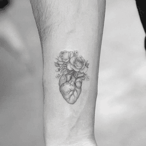 Realistic heart with flowers