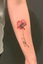 A poppy flower that continues into my mother's signature