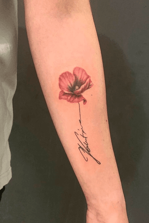 A poppy flower that continues into my mother's signature