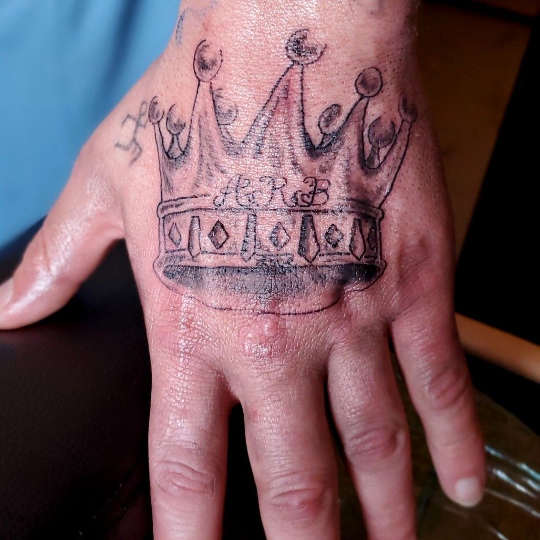 15 Unique Crown Tattoo Designs to Embrace Royalty