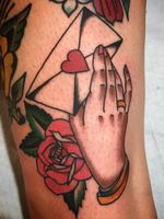 Tattoo of a hand by Dawn Cooke #DawnCooke #upperleg #leg #tattoosofhands #tattoohand #handtattoo #hands #fingers #color #traditional #letter #envelope #heart #rose