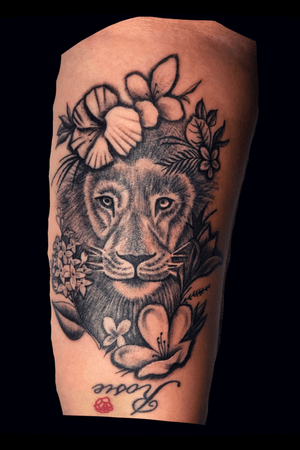 Lion flowers tattoo 