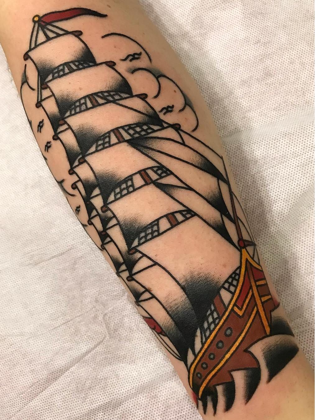 Traditional ship tattoo on the hand and forearm  Tattoogridnet
