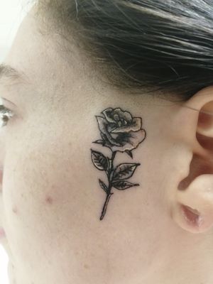Black and white rose face tattoo 