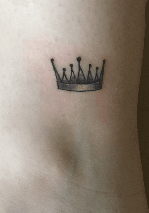 Small crown tattoo
