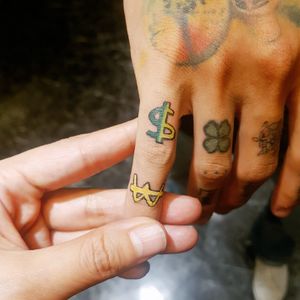 free-hand finger tattoo
