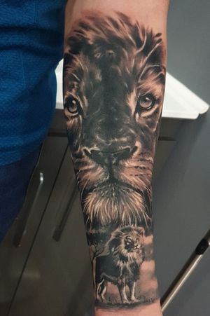 Lion tattoo with tree and small lion