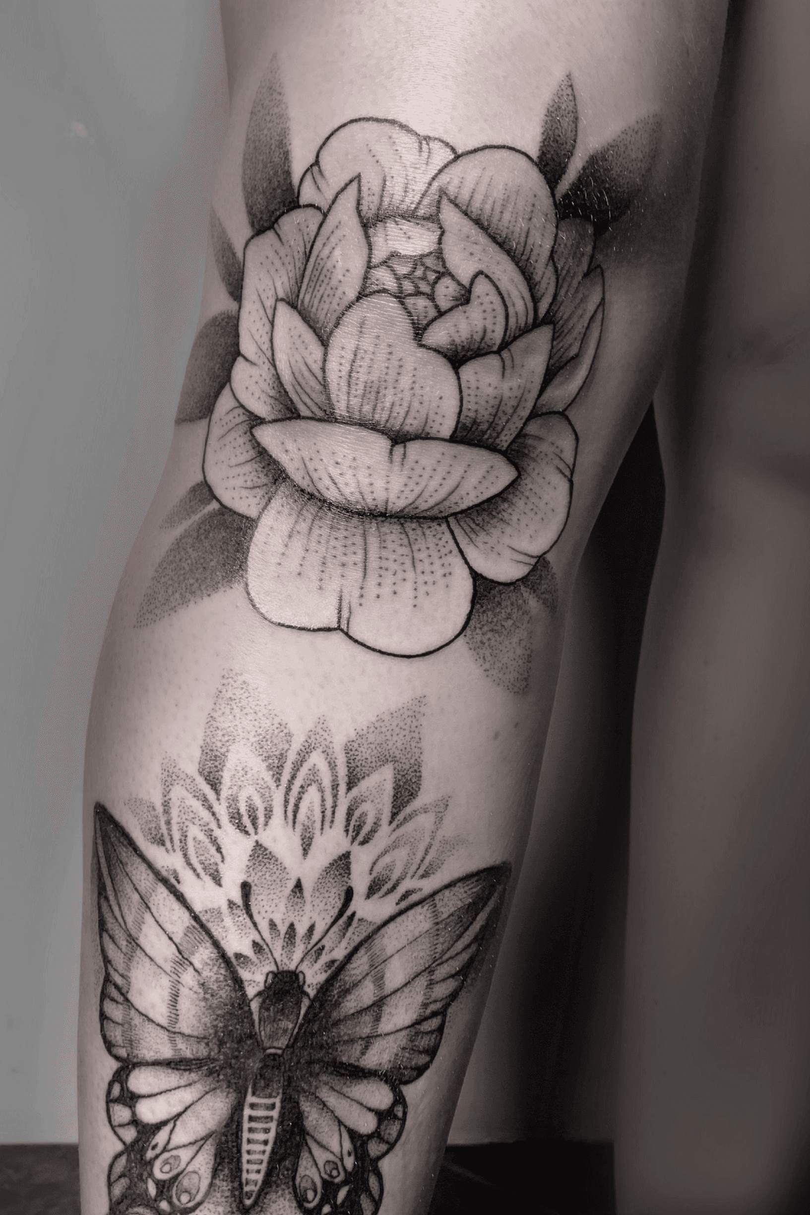 flower tattoo around kneeTikTok Search