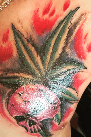 Weed leaf tattoo burning with skull 