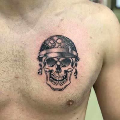 Chicano tattoo by #AlejandroLopez #chicano #chicanotattoo #blackandgrey #traditional #oldschool #illustrative #skull #helmet #death #chest