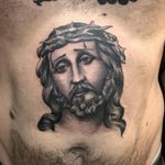 Chicano tattoo by #AlejandroLopez #chicano #chicanotattoo #blackandgrey #traditional #oldschool #illustrative #jesus #stomach #crownofthorns #religious #portrait #catholic