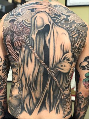 Chicano tattoo by #AlejandroLopez #chicano #chicanotattoo #blackandgrey #traditional #oldschool #illustrative #cobra #spiderweb #lips #gun #reaper #scythe #sacredheart #dice #skull #ladyhead #back #backpiece
