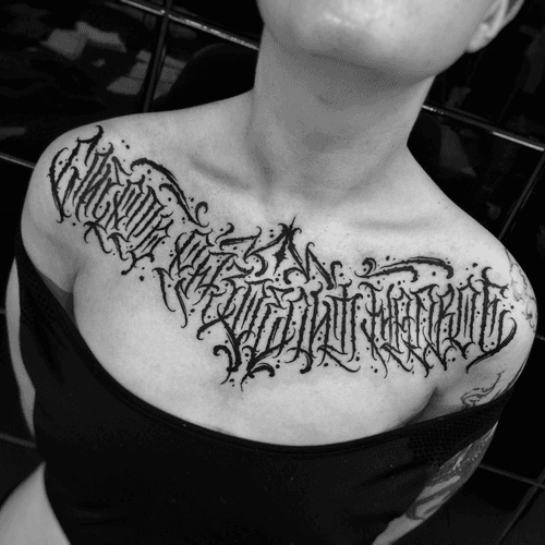 Black metal font tattoo