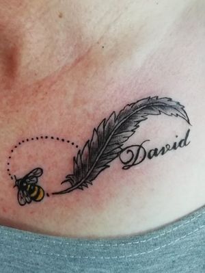 Infinite symbol and bee custom tattoo design 