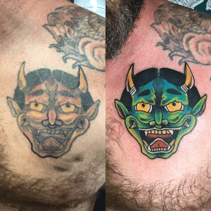 Revival of an old tattoo on my dad. 👹 ignore the fresh line, i had already started before i realized i needed to take a photo lol - we left the original imperfect symmetry & just brought it back to life  #devil #mask #demon #traditional #oldschool #green #color #eternalink 