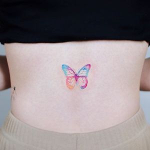Back tattoo by Arles Tattoo #ArlesTattoo #butterfly #watercolor #color #illustrative #nature #cute #small  #tattoodo #tattoodoapp #tattoodoappartists #besttattoos #awesometattoos  #cooltattoos