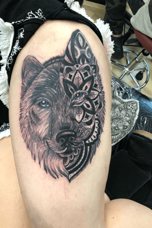 Wolf/mandela type design done on the thigh